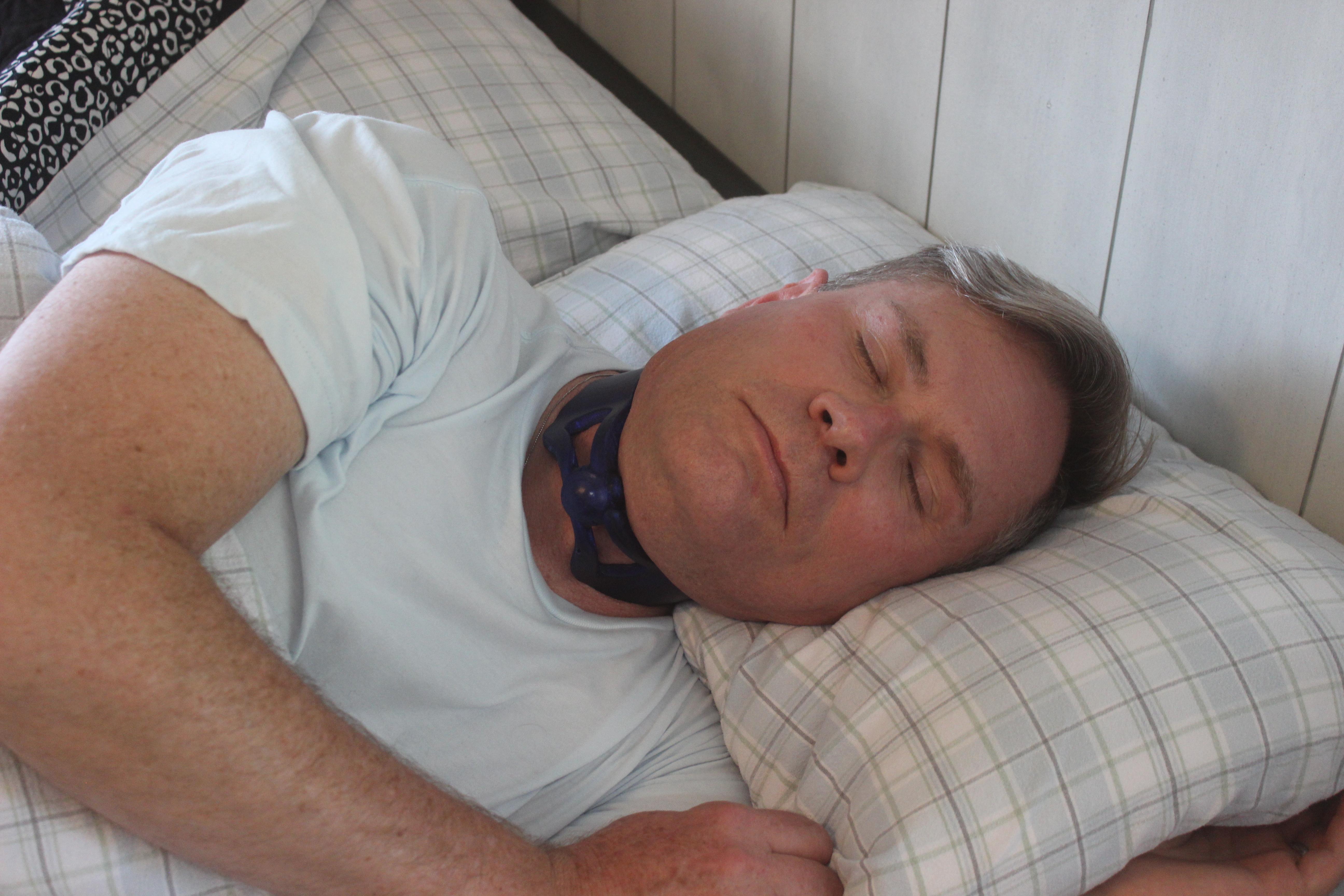 Patient sleeping comfortably with Corsomed neck brace